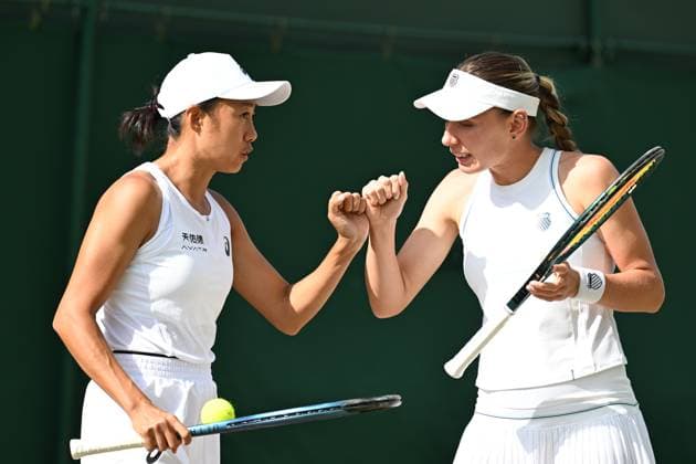 (250707) -- LONDON, July 7, 2025 -- Zhang Shuai (L) Ekaterina Alexandrova react during the women s doubles third round match between Zhang Shuai (China) Ekaterina Alexandrova (Russia) and Hsieh Su-Wei (Chinese Taipei) Jelena Ostapenko (Latvia) at the Wimbledon Tennis Championships in London, Britain, July 6, 2025. ) (SP)BRITAIN-LONDON-TENNIS-WIMBLEDON-WOMEN S DOUBLES ZhaoxDingzhe 