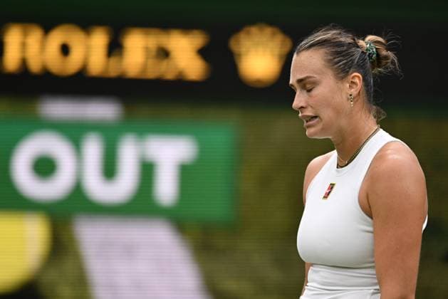 (250707) -- LONDON, July 7, 2025 -- Aryna Sabalenka reacts during the women s singles fourth round match between Aryna Sabalenka of Belarus and Elise Mertens of Belgium at the Wimbledon Tennis Championships in London, Britain, July 6, 2025. ) (SP)BRITAIN-LONDON-TENNIS-WIMBLEDON-WOMEN S SINGLES ZhaoxDingzhe 