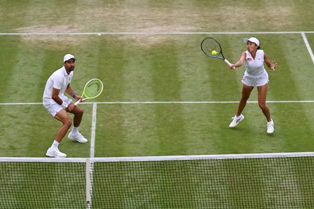 (250707) -- LONDON, July 7, 2025 -- Zhang Shuai (R) Marcelo Arevalo compete during the mixed doubles second round match between Zhang Shuai (China) Marcelo Arevalo (El Salvador) and Jiang Xinyu (China) Yuki Bhambri (India) at the Wimbledon Tennis Championships in London, Britain, July 6, 2025. ) (SP)BRITAIN-LONDON-TENNIS-WIMBLEDON-MIXED DOUBLES ZhaoxDingzhe 