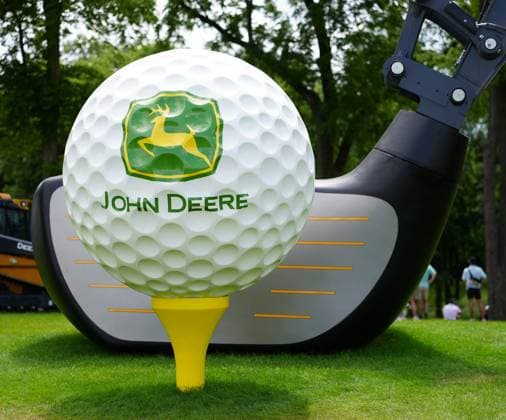 SILVIS, IL - JULY 06: A John Deere tractor has a large driver as an implement as seen on the 9th hole during the final round of the John Deere Classic on July 6, 2025, at TPC Deere Run in Silvis, Illinois. (Photo by Brian Spurlock Icon Sportswire) GOLF: JUL 06 PGA, Golf Herren John Deere Classic EDITORIAL USE ONLY Icon25070645