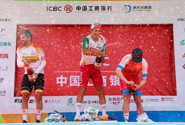 XINING, CHINA - JULY 06: First placed Manuel Penalver Aniorte (C) of Team Polti Visitmalta, second placed Eduard-Michael Grosu (L) of Huansheng-Vonoa-Taishan Team and third placed Alexander Salby of Li Ning Star celebrate on the podium after Stage 1 of the Tour of Magnificent Qinghai international Road cycling, Rad, Radsport, Strasse race on July 6, 2025 in Xining, Qinghai Province of China.  Copyright: xChinaxNewsxServicex 111578046106