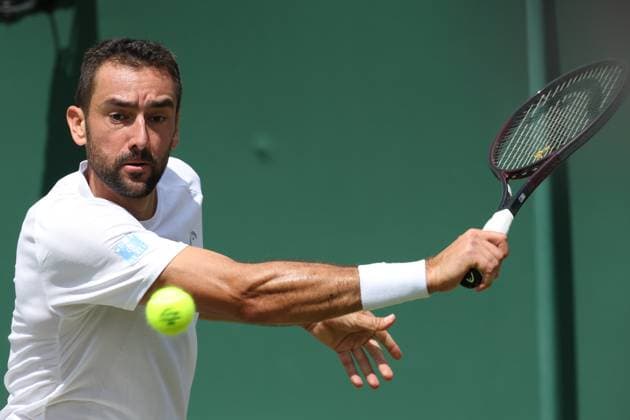 July 7, 2025, London, Celestynow, United Kingdom: MARIN CILIC of Croatia during the match against F. Cobolli of Italy in the 1 8 finals of Championships 2025 at Wimbledon AELTC in London. London United Kingdom - ZUMAc278 20250707_zsp_c278_017 Copyright: xMarcinxCholewinskix
