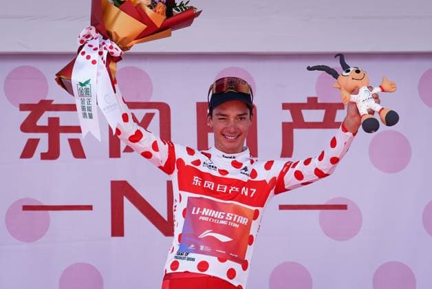(250707) -- XINING, July 7, 2025 -- Simon Pellaud of Li Ning Star celebrates in the polka-dot jersey on the podium after Stage 2 of the Tour of Magnificent Qinghai International Road cycling, Rad, Radsport, Strasse Race from Duoba to Huzhu, northwest China s Qinghai Province, July 7, 2025. ) (SP)CHINA-QINGHAI-CYCLING-TOUR OF MAGNIFICENT QINGHAI-STAGE 2 (CN) QixZhiyue 