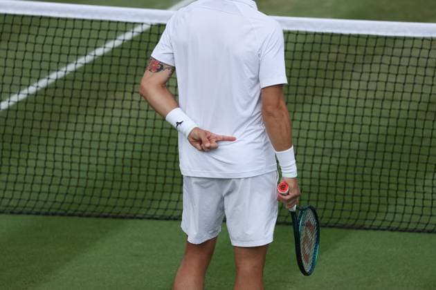 7th July 2025; All England Lawn Tennis and Croquet Club, London, England; Wimbledon Tennis Tournament, Day 8; Guido Andreozzi (ARG) sifnals serving options to Marcelo Demoliner (BRA)  ActionPlus12811170 JohnxPatrickxFletcher