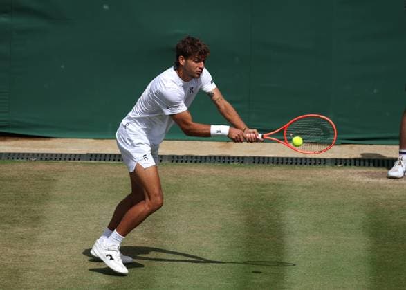 7th July 2025; All England Lawn Tennis and Croquet Club, London, England; Wimbledon Tennis Tournament, Day 8; Flavio Cobolli (ITA) with a backhand shot to Marin Cilic (CRO)  ActionPlus12811195 JohnxPatrickxFletcher