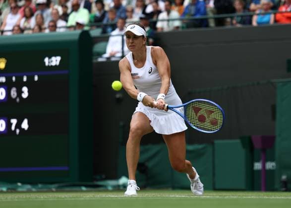 7th July 2025; All England Lawn Tennis and Croquet Club, London, England; Wimbledon Tennis Tournament, Day 8; Belinda Bencic (SUI) with a backhand shot to Ekaterina Alexandrova (RUS)  ActionPlus12811224 JohnxPatrickxFletcher
