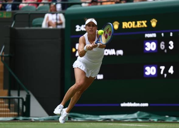 7th July 2025; All England Lawn Tennis and Croquet Club, London, England; Wimbledon Tennis Tournament, Day 8; Belinda Bencic (SUI) with a backhand shot to Ekaterina Alexandrova (RUS)  ActionPlus12811225 JohnxPatrickxFletcher