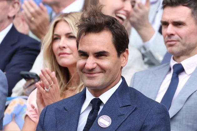 Swiss Roger Federer watches a tennis match on day eight of the 2025 Wimbledon Championships in London on Monday, July 07, 2025.  LON2025070712 HUGOxPHILPOTT
