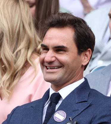 Swiss Roger Federer watches a tennis match on day eight of the 2025 Wimbledon Championships in London on Monday, July 07, 2025.  LON2025070713 HUGOxPHILPOTT