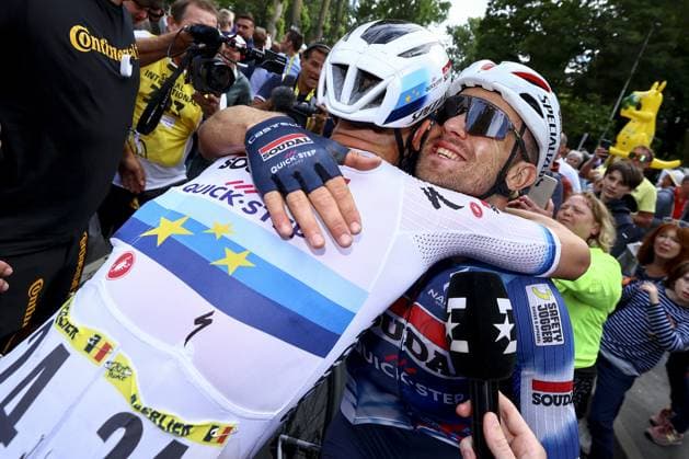 Belgian Tim Merlier of Soudal Quick-Step celebrates after winning the third stage of the 2025 Tour de France cycling, from Valenciennes to Dunkerque (178 km) on Monday 07 July 2025 in France. The 112th edition of the Tour de France starts on Saturday 5 July in Lille, France, and will finish in Paris, France on the 27th of July. DAVIDxPINTENS  x128609898x