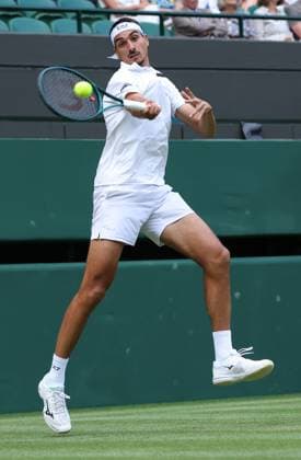 Italian Lorenzo Sonego plays a forehand in his fourth round match against American Ben Shelton on day eight of the 2025 Wimbledon Championships in London on Monday, July 07, 2025.  LON2025070740 HUGOxPHILPOTT