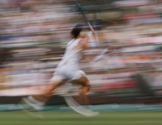 American Ben Shelton plays in his fourth round match against Italian Lorenzo Sonego on day eight of the 2025 Wimbledon Championships in London on Monday, July 07, 2025.  LON2025070755 HUGOxPHILPOTT
