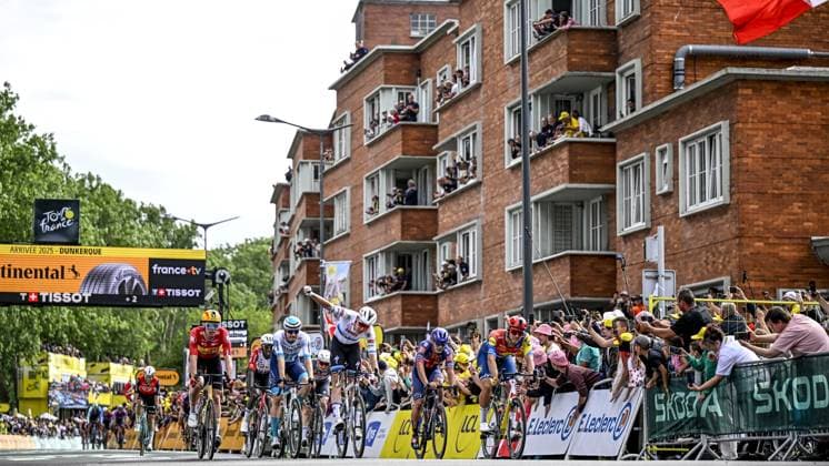 Belgian Tim Merlier of Soudal Quick-Step celebrates after winning the third stage of the 2025 Tour de France cycling, from Valenciennes to Dunkerque (178 km) on Monday 07 July 2025 in France. The 112th edition of the Tour de France starts on Saturday 5 July in Lille, France, and will finish in Paris, France on the 27th of July. JASPERxJACOBS  x128612597x
