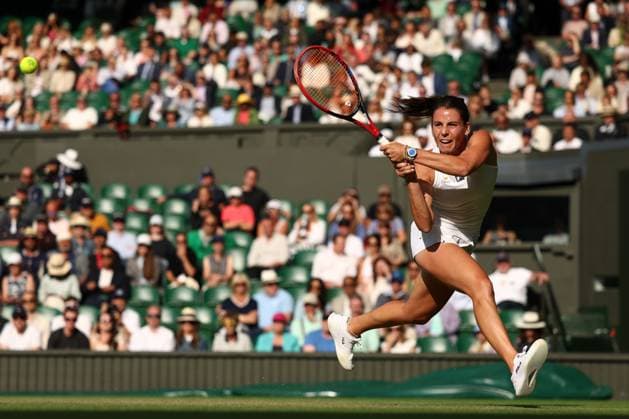 7th July 2025; All England Lawn Tennis and Croquet Club, London, England; Wimbledon Tennis Tournament, Day 8; Emma Navarro (USA) with a backhand shot to Mirra Andreeva (RUS)  ActionPlus12811268 JohnxPatrickxFletcher