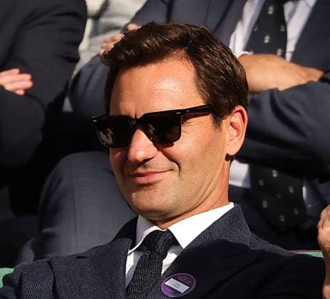 Swiss Roger Federer watches the tennis in the Royal box on day eight of the 2025 Wimbledon Championships in London on Monday, July 07, 2025.  LON2025070780 HUGOxPHILPOTT