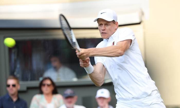 Italian Jannik Sinner plays a backhand in his fourth round match against Bulgarian Grigor Dimitrov on day eight of the 2025 Wimbledon Championships in London on Monday, July 07, 2025.  LON2025070790 HUGOxPHILPOTT