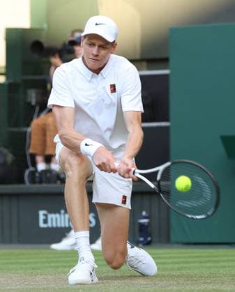 Italian Jannik Sinner plays a backhand in his fourth round match against Bulgarian Grigor Dimitrov on day eight of the 2025 Wimbledon Championships in London on Monday, July 07, 2025.  LON2025070794 HUGOxPHILPOTT