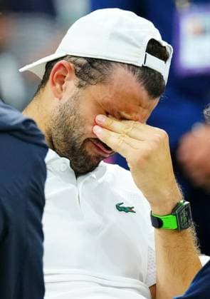 A tearful Grigor Dimitrov after being forced to retire during his fourth round match against Jannik Sinner despite being two sets up Wimbledon Tennis Championships, Day 9, The All England Lawn Tennis and Croquet Club, London, UK - 08 Jul 2025London The All England Lawn Tennis and United Kingdom  Copyright: xJavierxGarcia Shutterstockx 15389334l