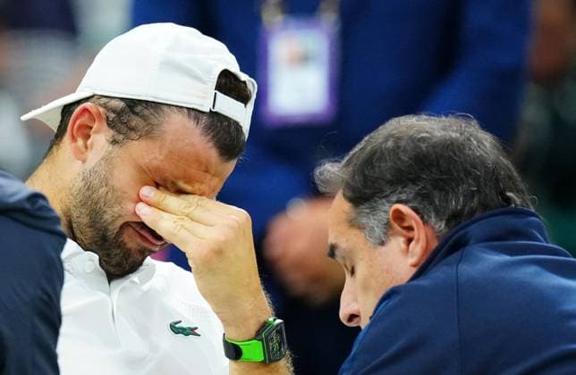 A tearful Grigor Dimitrov after being forced to retire during his fourth round match against Jannik Sinner despite being two sets up Wimbledon Tennis Championships, Day 9, The All England Lawn Tennis and Croquet Club, London, UK - 08 Jul 2025London The All England Lawn Tennis and United Kingdom  Copyright: xJavierxGarcia Shutterstockx 15389334ab