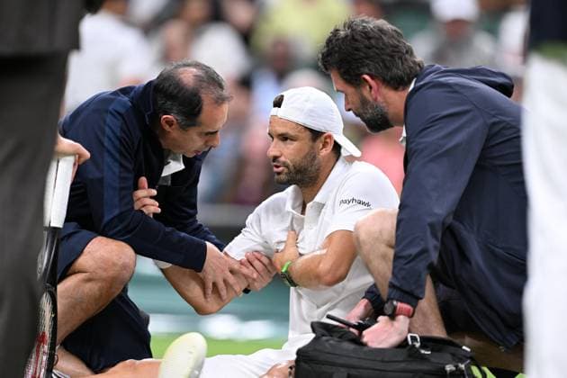 Grigor Dimitrov goes down injured when leading 2 sets to 0 during his Wimbledon 2025 Men?s Singles Round of 16 tennis match against Jannik Sinner at the All England Tennis Club in London, England (Richard Callis Sports Press Photo SPP) Copyright: xRichardxCallis SportsxPressxPhotox xSPPx spp-en-RiCaPrPh-SPP25_rica_07072025_21982