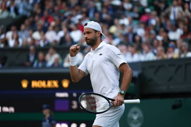 7th July 2025; All England Lawn Tennis and Croquet Club, London, England; Wimbledon Tennis Tournament, Day 8; Grigor Dimitrov (BUL) celebrates towards his coaches after winning the 2nd set against Jannik Sinner (ITA)  ActionPlus12811301 JohnxPatrickxFletcher