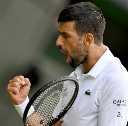 (250708) -- LONDON, July 8, 2025 -- Novak Djokovic reacts during the men s singles round of 16 match between Novak Djokovic of Serbia and Alex De Minaur of Australia at the Wimbledon Tennis Championships in London, Britain, July 7, 2025. ) (SP)BRITAIN-LONDON-TENNIS-WIMBLEDON-MEN S SINGLES LixYing 