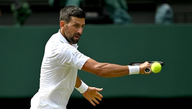 (250708) -- LONDON, July 8, 2025 -- Novak Djokovic hits a return during the men s singles round of 16 match between Novak Djokovic of Serbia and Alex De Minaur of Australia at the Wimbledon Tennis Championships in London, Britain, July 7, 2025. ) (SP)BRITAIN-LONDON-TENNIS-WIMBLEDON-MEN S SINGLES LixYing 