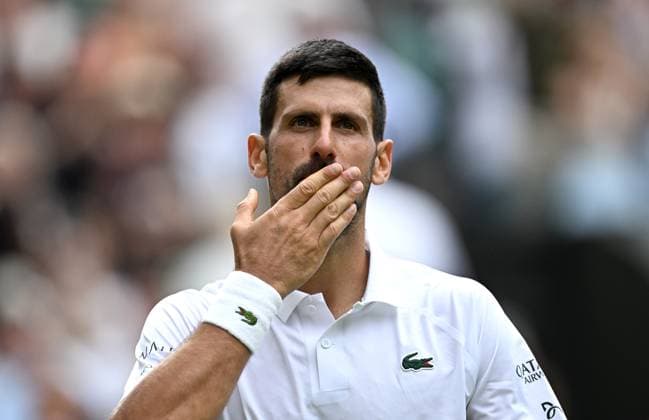 (250708) -- LONDON, July 8, 2025 -- Novak Djokovic celebrates after the men s singles round of 16 match between Novak Djokovic of Serbia and Alex De Minaur of Australia at the Wimbledon Tennis Championships in London, Britain, July 7, 2025. ) (SP)BRITAIN-LONDON-TENNIS-WIMBLEDON-MEN S SINGLES LixYing 