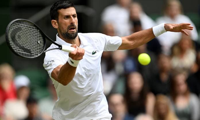 (250708) -- LONDON, July 8, 2025 -- Novak Djokovic hits a return during the men s singles round of 16 match between Novak Djokovic of Serbia and Alex De Minaur of Australia at the Wimbledon Tennis Championships in London, Britain, July 7, 2025. ) (SP)BRITAIN-LONDON-TENNIS-WIMBLEDON-MEN S SINGLES LixYing 