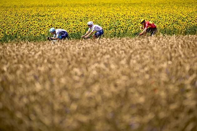 French Lenny Martinez of Bahrain Victorious, French Thomas Gachignard of TotalEnergies and Norwegian Jonas Abrahamsen of Uno-X Mobility pictured in action during the fourth stage of the 2025 Tour de France cycling, Amien Metropole - Rouen (173 km), on Tuesday 08 July 2025 in France. The 112th edition of the Tour de France starts on Saturday 5 July in Lille, France, and will finish in Paris, France on the 27th of July. JASPERxJACOBS  x128682312x