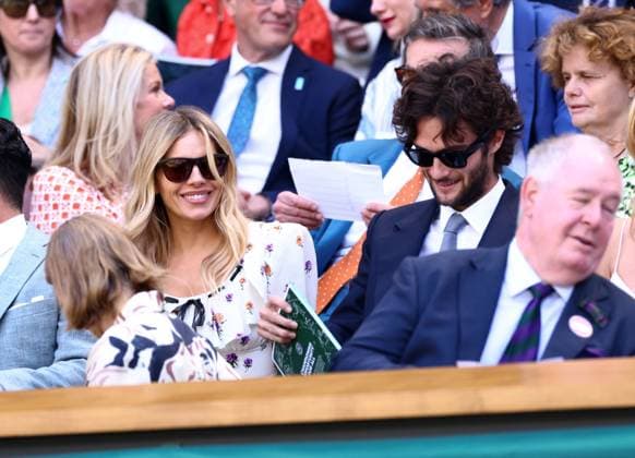Sienna Miller and Oli Green in the Royal Box on Centre Court Wimbledon Tennis Championships, Day 9, The All England Lawn Tennis and Croquet Club, London, UK - 08 Jul 2025London The All England Lawn Tennis and United Kingdom  Copyright: xJamesxMarsh Shutterstockx 15389336f