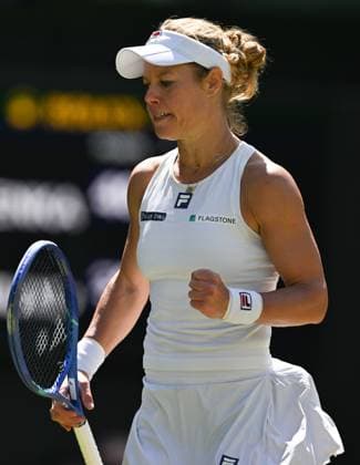(250708) -- LONDON, July 8, 2025 -- Laura Siegemund reacts during the women s singles quarterfinal match between Aryna Sabalenka of Belarus and Laura Siegemund of Germany at the Wimbledon Tennis Championships in London, Britain, July 8, 2025. ) (SP)BRITAIN-LONDON-TENNIS-WIMBLEDON-WOMEN S SINGLES LixYing 