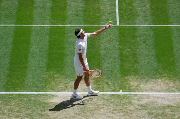Wimbledon 2025 Taylor Fritz v Karen Khachanov Wimbledon Championships 2025 Day 9, 08 07 25 Gentlemens’ Singles - Quarter Final Court No.1 Taylor Fritz v Karen Khachanov Taylor Fritz in action  Copyright: xMarcxAsplandx NINTCHDBPICT001008448430