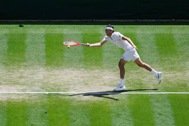 Wimbledon 2025 Taylor Fritz v Karen Khachanov Wimbledon Championships 2025 Day 9, 08 07 25 Gentlemens’ Singles - Quarter Final Court No.1 Taylor Fritz v Karen Khachanov Taylor Fritz in action  Copyright: xMarcxAsplandx NINTCHDBPICT001008448445