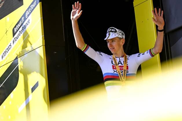 Slovenian Tadej Pogacar of UAE Team Emirates celebrates on the podium after winning the fourth stage of the 2025 Tour de France cycling, Amien Metropole - Rouen (173 km), on Tuesday 08 July 2025 in France. The 112th edition of the Tour de France starts on Saturday 5 July in Lille, France, and will finish in Paris, France on the 27th of July. JASPERxJACOBS  x128710834x
