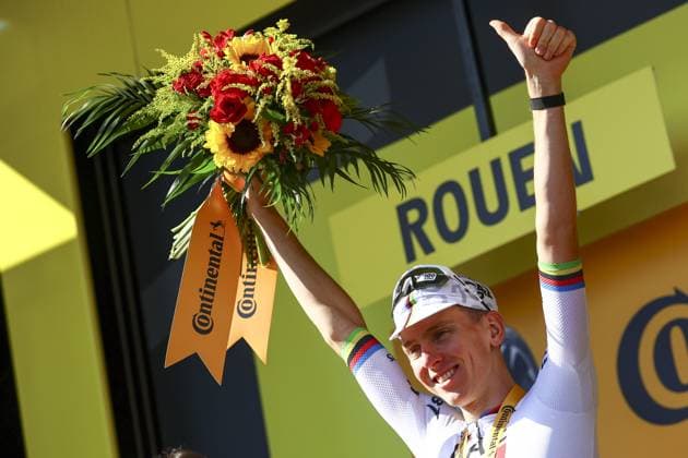 Slovenian Tadej Pogacar of UAE Team Emirates celebrates on the podium after winning the fourth stage of the 2025 Tour de France cycling, Amien Metropole - Rouen (173 km), on Tuesday 08 July 2025 in France. The 112th edition of the Tour de France starts on Saturday 5 July in Lille, France, and will finish in Paris, France on the 27th of July. DAVIDxPINTENS  x128711022x