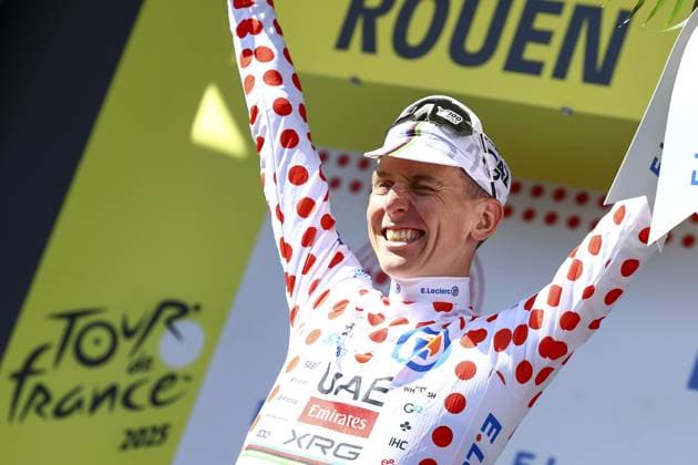 Slovenian Tadej Pogacar of UAE Team Emirates celebrates on the podium in the red polka-dot jersey for best climber after the fourth stage of the 2025 Tour de France cycling, Amien Metropole - Rouen (173 km), on Tuesday 08 July 2025 in France. The 112th edition of the Tour de France starts on Saturday 5 July in Lille, France, and will finish in Paris, France on the 27th of July. DAVIDxPINTENS  x128711027x