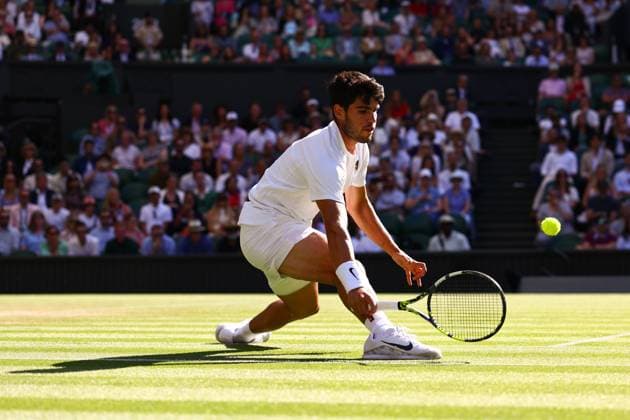 Carlos Alcaraz during his quarter final match Wimbledon Tennis Championships, Day 9, The All England Lawn Tennis and Croquet Club, London, UK - 08 Jul 2025London The All England Lawn Tennis and United Kingdom  Copyright: xJamesxMarsh Shutterstockx 15389336ga