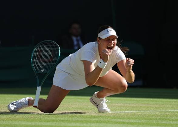 i8th July 2025; All England Lawn Tennis and Croquet Club, London, England; Wimbledon Tennis Tournament, Day 9; Amanda Anisimova (USA) celebrates by falling on the court after defeating Anastasia Pavlyuchenkova (RUS) in straight sets to be booked in to the Ladies Semi Final  ActionPlus12811418 JohnxPatrickxFletcher