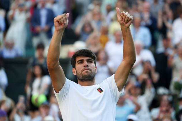 8th July 2025; All England Lawn Tennis and Croquet Club, London, England; Wimbledon Tennis Tournament, Day 9; Defending Champion Carlos Alcaraz (ESP) gives a thumbs up to the Centre Court crowd after defeating Cameron Norrie (GBR) to book his place in the Gentlemen& x2019;s singles Semi Final  ActionPlus12811421 JohnxPatrickxFletcher