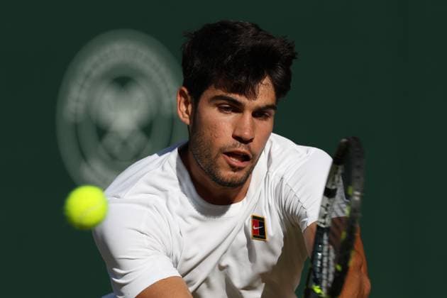 July 8, 2025, London, Celestynow, United Kingdom: CARLOS ALCARAZ of Spain during the match against C. Norrie of United Kingdom in the quarterfinal of Championships 2025 at Wimbledon AELTC in London. Alcaraz won 6:2, 6:3, 6:3 London United Kingdom - ZUMAc278 20250708_zsp_c278_045 Copyright: xMarcinxCholewinskix