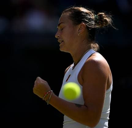 (250709) -- LONDON, July 9, 2025 -- Aryna Sabalenka celebrates scoring during the women s singles quarterfinal match between Aryna Sabalenka of Belarus and Laura Siegemund of Germany at the Wimbledon Tennis Championships in London, Britain, July 8, 2025. ) (SP)BRITAIN-LONDON-TENNIS-WIMBLEDON-WOMEN S SINGLES LixYing 