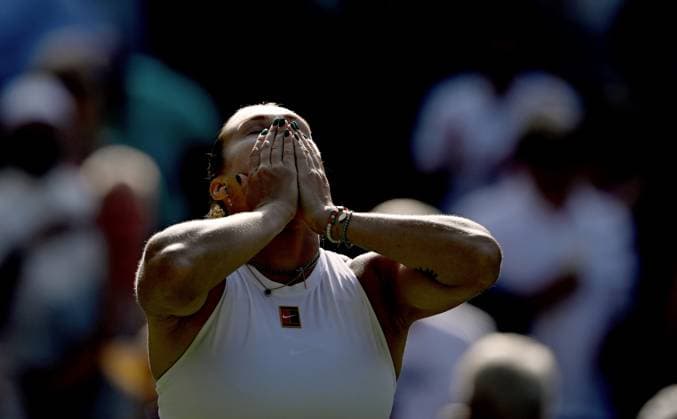(250709) -- LONDON, July 9, 2025 -- Aryna Sabalenka celebrates after winning the women s singles quarterfinal match between Aryna Sabalenka of Belarus and Laura Siegemund of Germany at the Wimbledon Tennis Championships in London, Britain, July 8, 2025. ) (SP)BRITAIN-LONDON-TENNIS-WIMBLEDON-WOMEN S SINGLES LixYing 