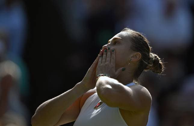 (250709) -- LONDON, July 9, 2025 -- Aryna Sabalenka celebrates after winning the women s singles quarterfinal match between Aryna Sabalenka of Belarus and Laura Siegemund of Germany at the Wimbledon Tennis Championships in London, Britain, July 8, 2025. ) (SP)BRITAIN-LONDON-TENNIS-WIMBLEDON-WOMEN S SINGLES LixYing 