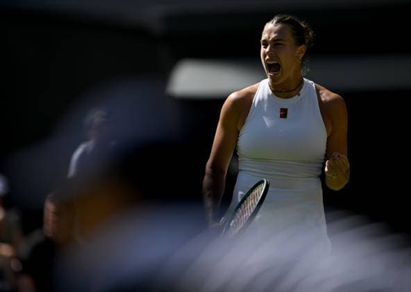 (250709) -- LONDON, July 9, 2025 -- Aryna Sabalenka celebrates scoring during the women s singles quarterfinal match between Aryna Sabalenka of Belarus and Laura Siegemund of Germany at the Wimbledon Tennis Championships in London, Britain, July 8, 2025. ) (SP)BRITAIN-LONDON-TENNIS-WIMBLEDON-WOMEN S SINGLES LixYing 