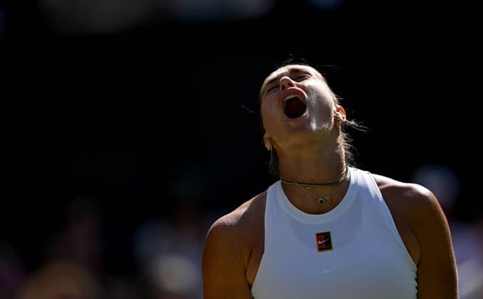 (250709) -- LONDON, July 9, 2025 -- Aryna Sabalenka reacts during the women s singles quarterfinal match between Aryna Sabalenka of Belarus and Laura Siegemund of Germany at the Wimbledon Tennis Championships in London, Britain, July 8, 2025. ) (SP)BRITAIN-LONDON-TENNIS-WIMBLEDON-WOMEN S SINGLES LixYing 