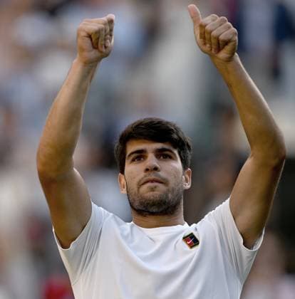 (250709) -- LONDON, July 9, 2025 -- Carlos Alcaraz celebrates after the men s singles quarterfinal match between Carlos Alcaraz of Spain and Cameron Norrie of Britain at the Wimbledon Tennis Championships in London, Britain, July 8, 2025. ) (SP)BRITAIN-LONDON-TENNIS-WIMBLEDON-MEN S SINGLES LixYing 