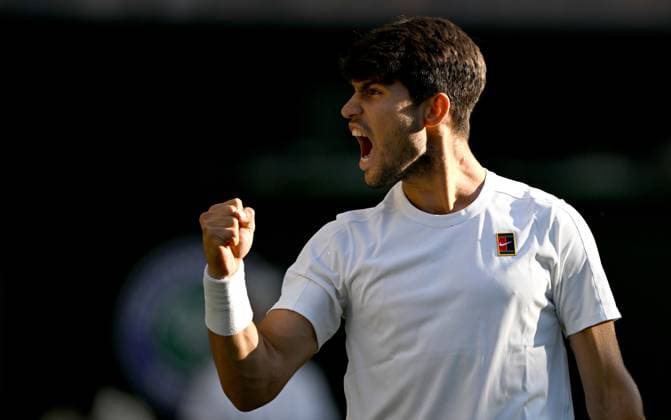 (250709) -- LONDON, July 9, 2025 -- Carlos Alcaraz celebrates after the men s singles quarterfinal match between Carlos Alcaraz of Spain and Cameron Norrie of Britain at the Wimbledon Tennis Championships in London, Britain, July 8, 2025. ) (SP)BRITAIN-LONDON-TENNIS-WIMBLEDON-MEN S SINGLES LixYing 