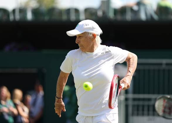 9th July 2025; All England Lawn Tennis and Croquet Club, London, England; Wimbledon Tennis Tournament, Day 10; Martina Navratilova (USA) with a forehand shot to Anne Keothavong (GBR)in her mixed doubles match  ActionPlus12811558 JohnxPatrickxFletcher