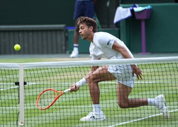 Tennis - 2025 Wimbledon Championships - Men™s singles- Quarter Final - Flavio Cobolli v Novak Djokovic All England Lawn Tennis & Croquet Club - Wednesday 9th July 2025 Flavio Cobolli of Italy 